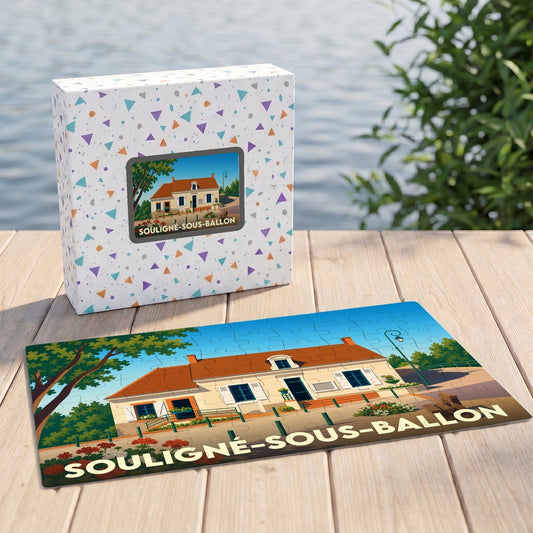 Puzzle souvenir de la ville de Souligné-sous-Ballon avec une illustration stylisée d'une maison traditionnelle.