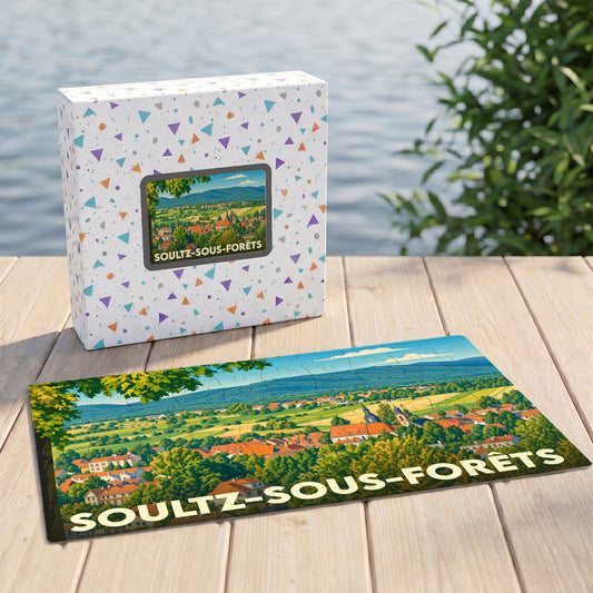 Puzzle souvenir de la ville de Soultz-sous-Forêts avec une illustration paysagère stylisée.