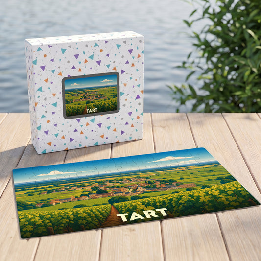 Puzzle souvenir de la ville de Tart avec une illustration de paysages de vignobles.