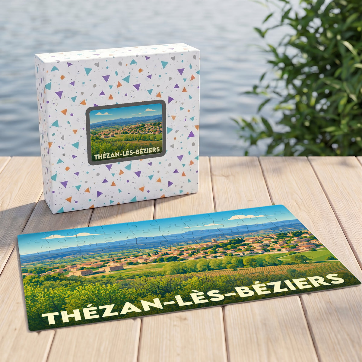 Puzzle souvenir de la ville de Thézan-lès-Béziers avec une illustration stylisée de son paysage.