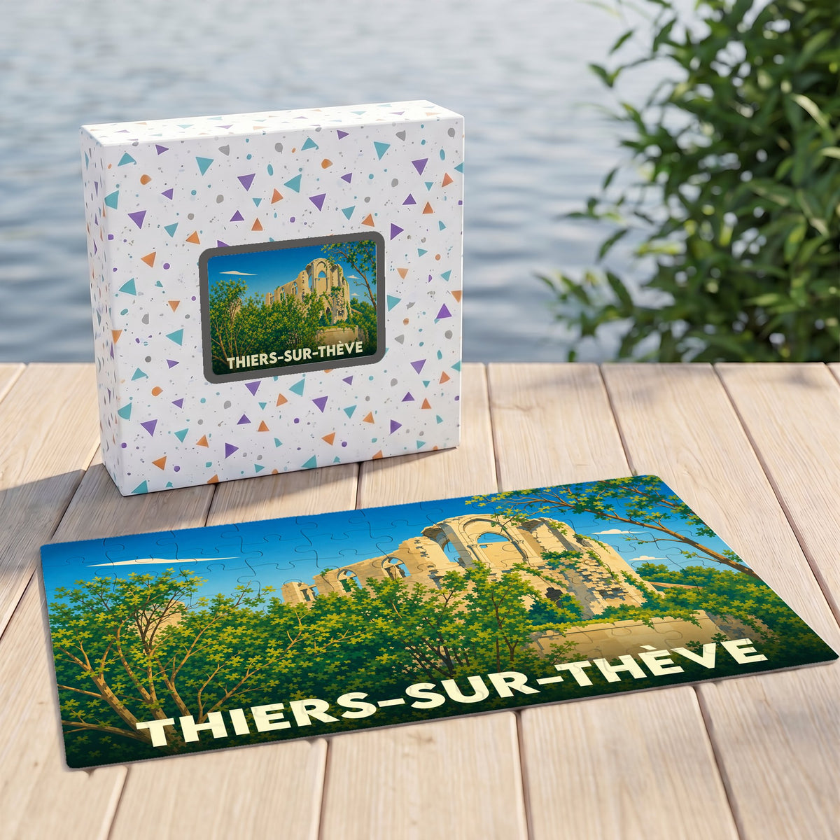 Puzzle souvenir de la ville de Thiers-sur-Thève avec une illustration stylisée de ses ruines historiques.