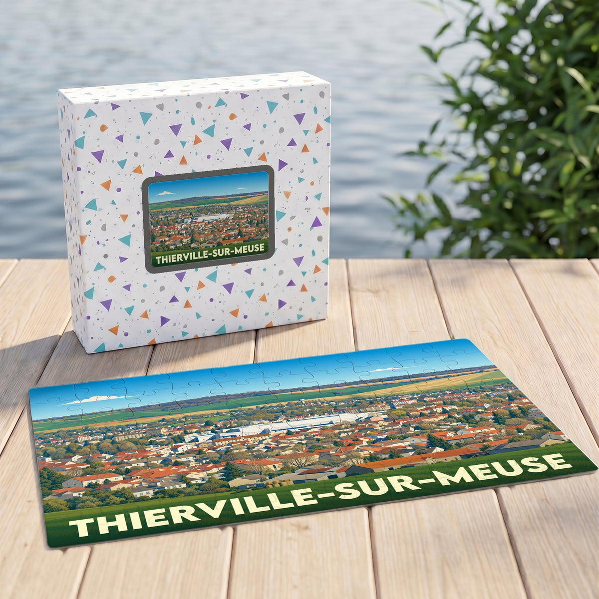 Puzzle souvenir de la ville de Thierville-sur-Meuse avec une illustration panoramique stylisée.