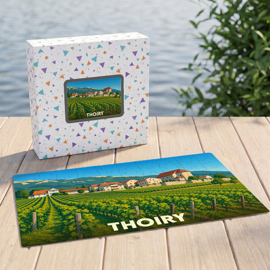 Puzzle souvenir de la ville de Thoiry représentant un paysage de vignobles et de maisons traditionnelles.