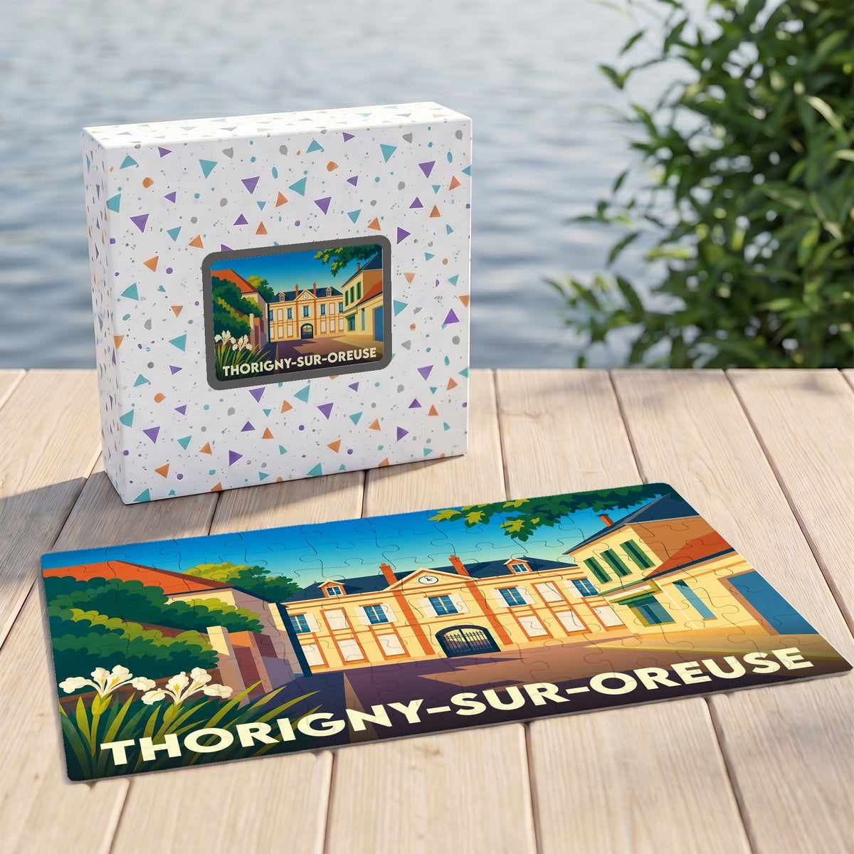 Puzzle souvenir de la ville de Thorigny-sur-Oreuse avec une illustration colorée et stylisée.
