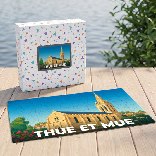 Puzzle souvenir de la commune de Thue et Mue illustré d'une église stylisée et accompagné de sa boîte.
