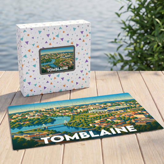Puzzle souvenir de la ville de Tomblaine avec une illustration panoramique stylisée.