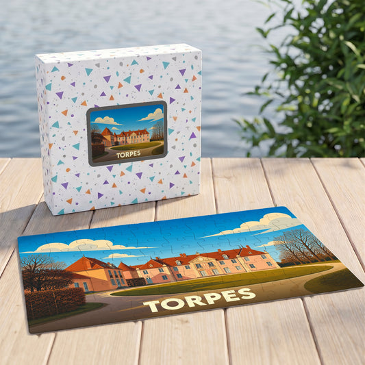 Puzzle souvenir de la ville de Torpes avec une illustration stylisée d'un château.