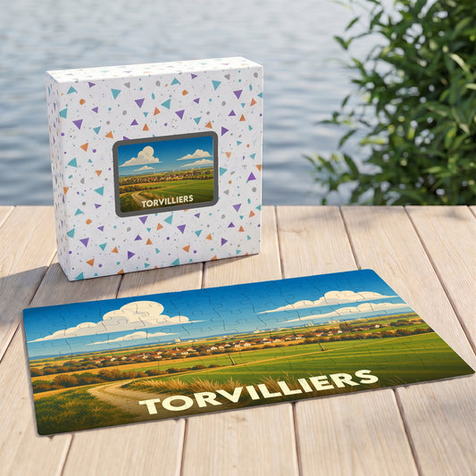 Puzzle souvenir de la ville de Torvilliers avec une illustration de paysage champêtre.