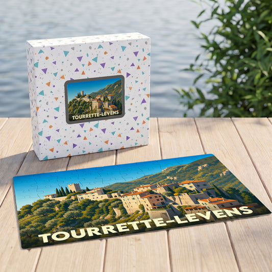 Puzzle souvenir de la ville de Tourrette-Levens avec une illustration stylisée d'un village perché.