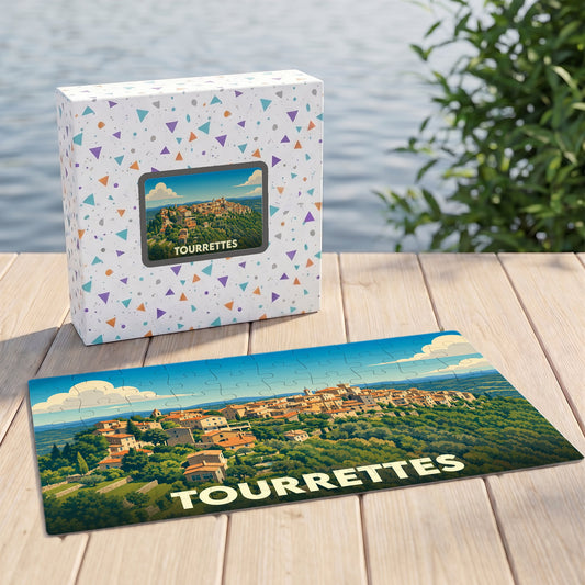Puzzle souvenir de la ville de Tourrettes illustrant un paysage provençal avec sa boîte assortie.