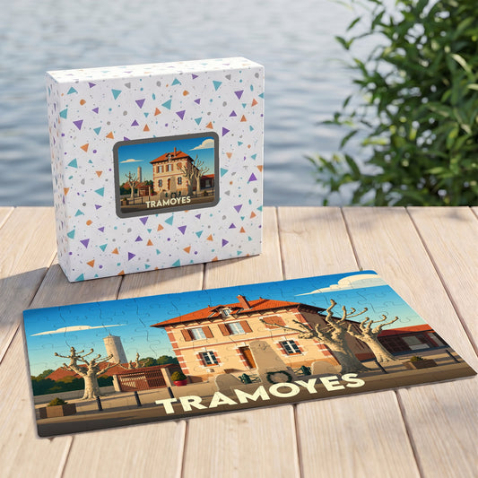 Puzzle souvenir de la ville de Tramoyes avec une illustration stylisée.