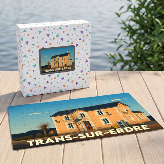 Puzzle souvenir de la ville de Trans-sur-Erdre avec une illustration stylisée d'un bâtiment local.