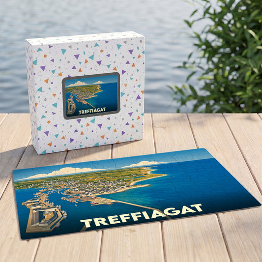 Puzzle souvenir de la ville de Treffiagat présentant une vue aérienne illustrée du port et du littoral.