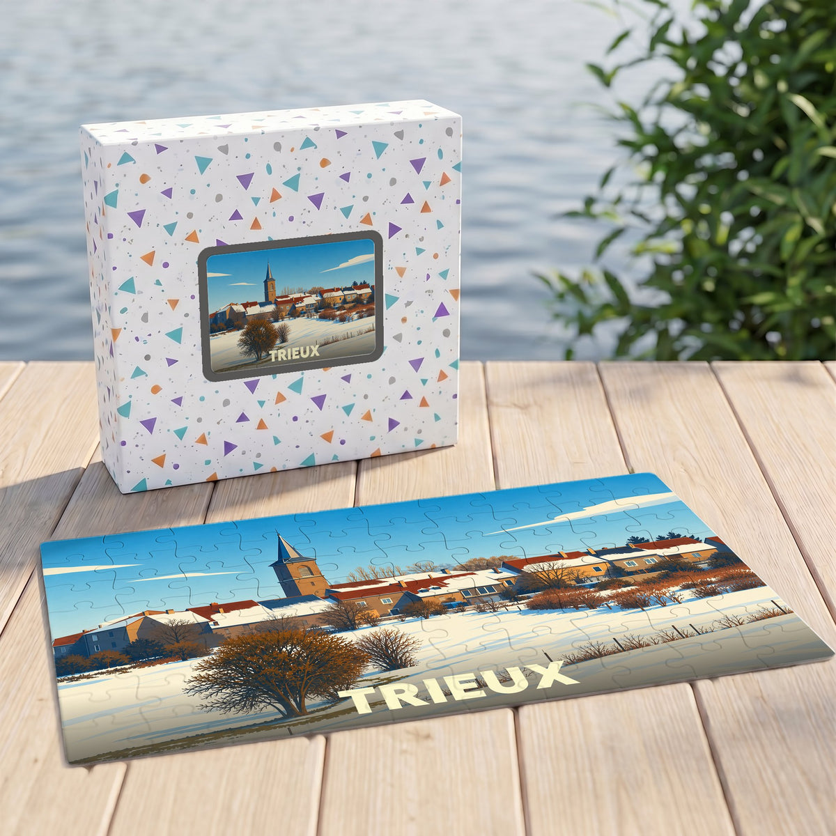 Puzzle souvenir de la ville de Trieux avec une illustration stylisée d'un paysage enneigé.