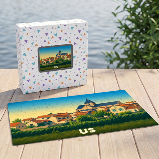 Puzzle souvenir de la ville de Us avec une illustration colorée du village et de son église.