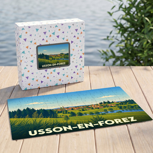 Puzzle souvenir de la ville d'Usson-en-Forez avec une illustration stylisée de son paysage champêtre.