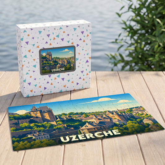 Puzzle souvenir de la ville d'Uzerche avec une illustration stylisée d'un paysage urbain historique.