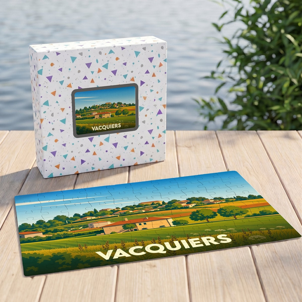 Puzzle souvenir de la ville de Vacquiers avec une illustration paysagère stylisée.