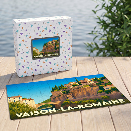 Puzzle souvenir de la ville de Vaison-la-Romaine avec une illustration stylisée de son pont romain et de sa cité médiévale.