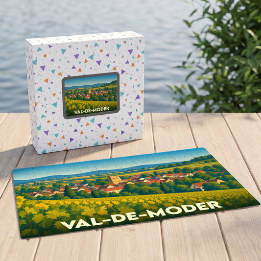 Puzzle souvenir de la ville de Val-de-Moder avec une illustration stylisée d'un paysage rural.