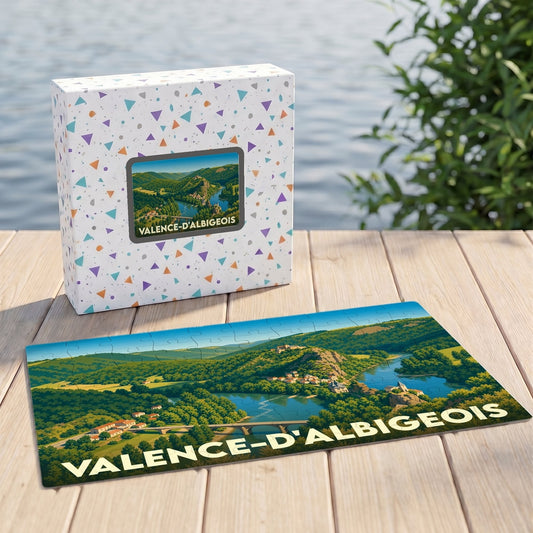 Puzzle souvenir de la ville de Valence-d'Albigeois avec une illustration de paysage de vallée fluviale.