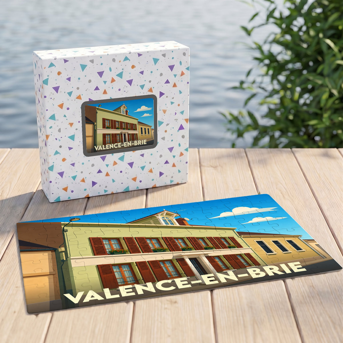 Puzzle souvenir de la ville de Valence-en-Brie avec une illustration stylisée d'une maison traditionnelle.