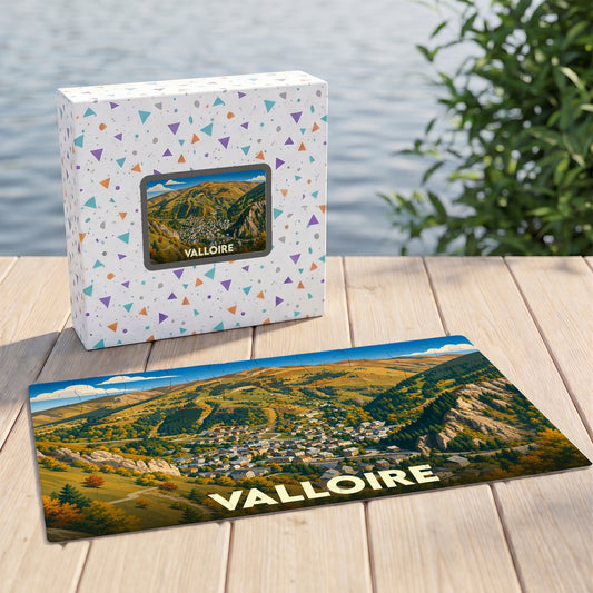 Puzzle souvenir de la ville de Valloire illustré d'un paysage montagneux stylisé.