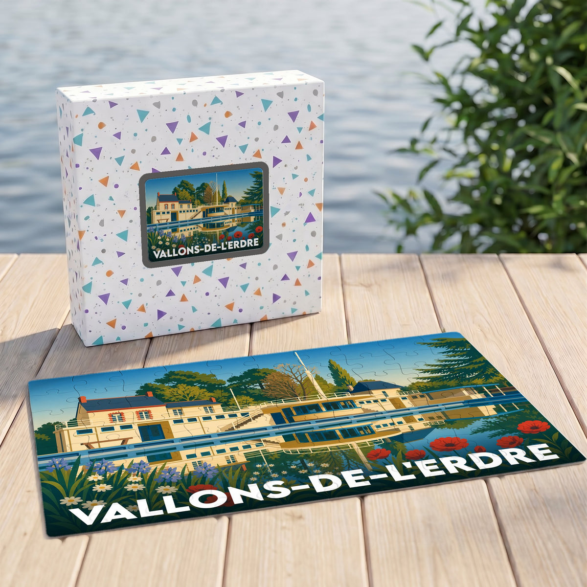 Puzzle souvenir de la commune de Vallons-de-l'Erdre avec une illustration stylisée d'un paysage de bord de l'eau.