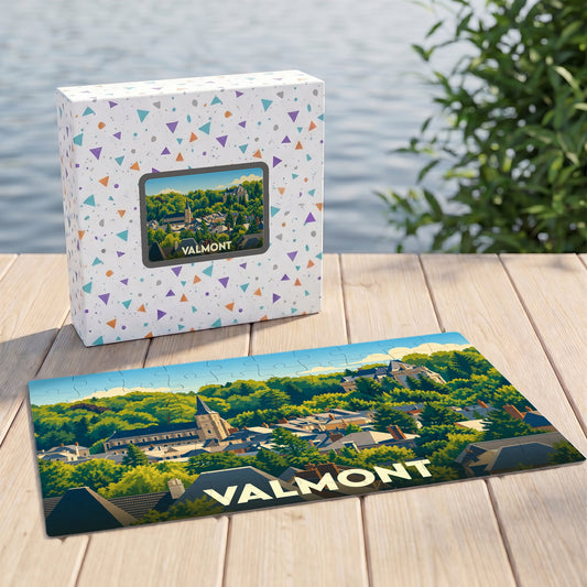 Puzzle souvenir de la ville de Valmont avec une illustration stylisée d'un paysage urbain verdoyant.