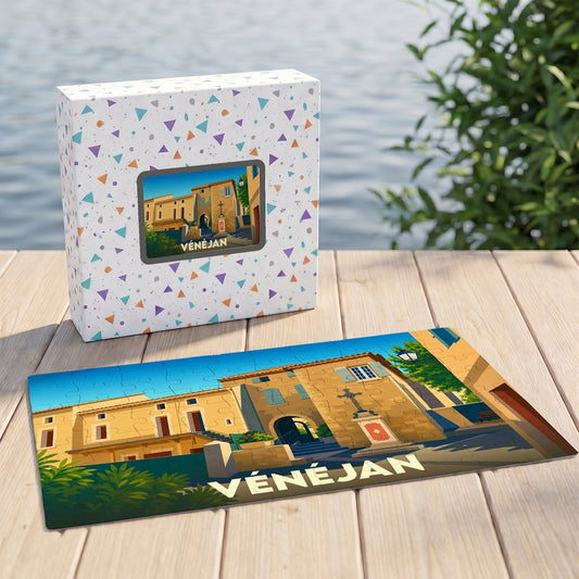 Puzzle souvenir de la ville de Vénéjan avec une illustration stylisée et sa boîte assortie.