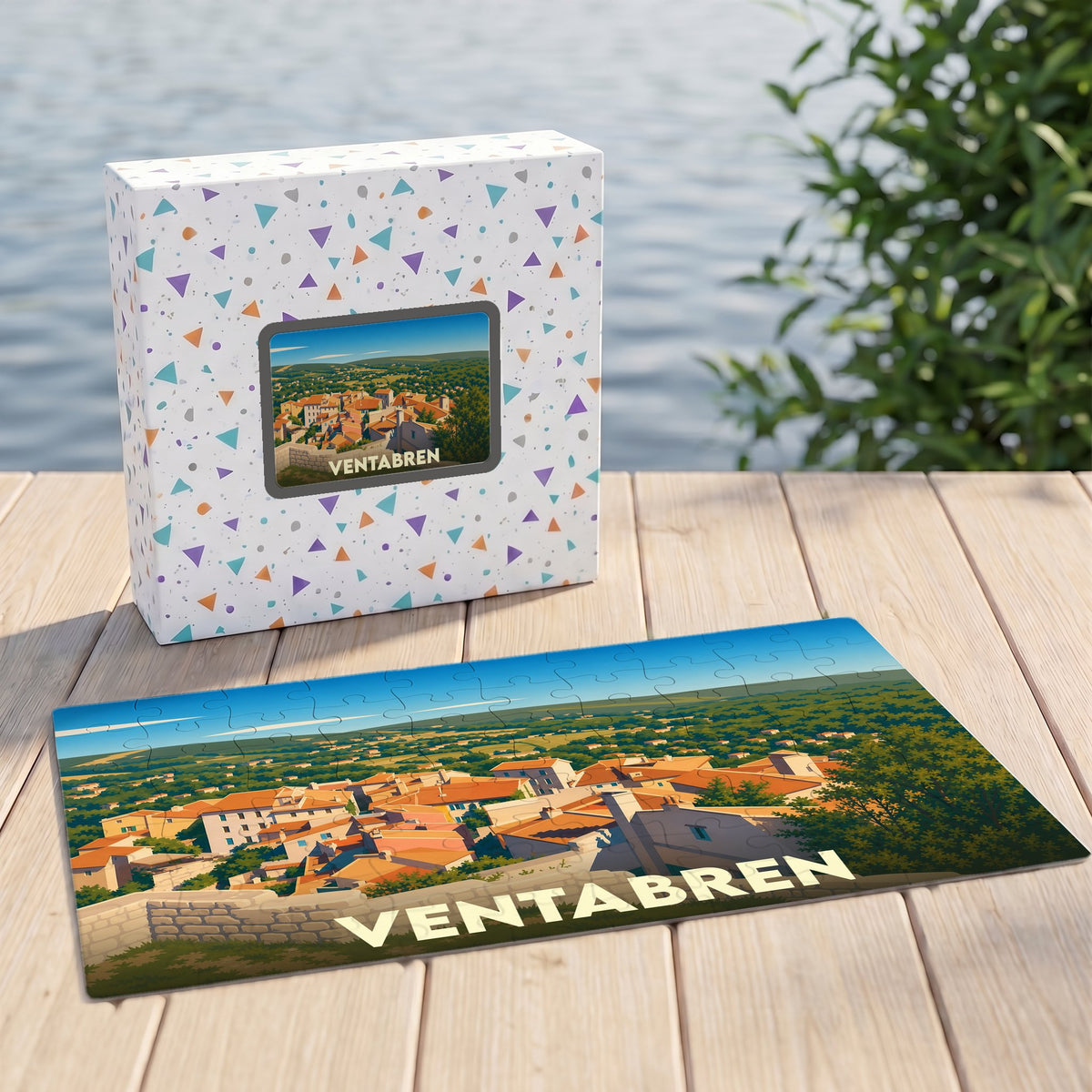 Puzzle souvenir de la ville de Ventabren avec une illustration stylisée d'un village provençal.