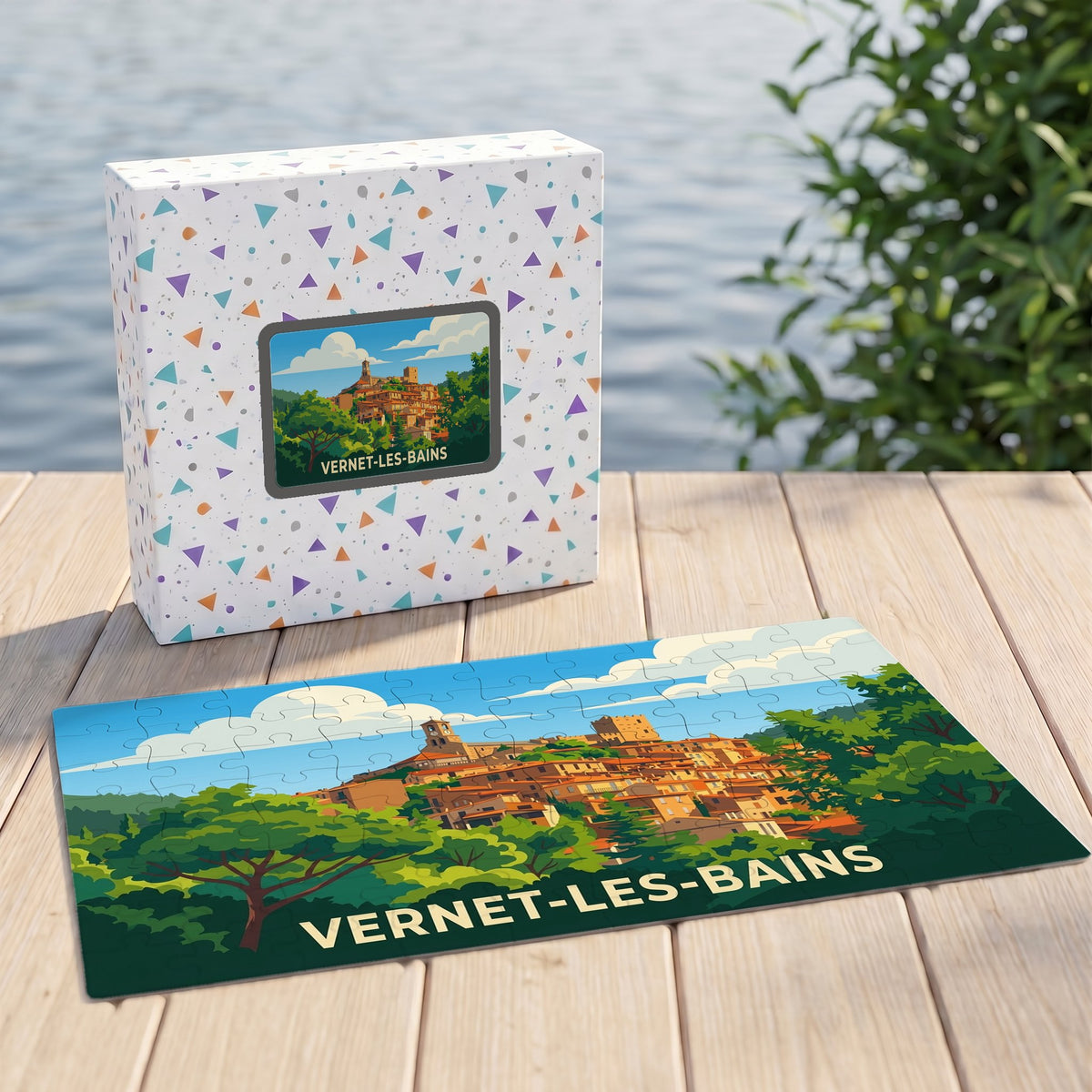 Puzzle souvenir de la ville de Vernet-les-Bains avec une illustration stylisée et sa boîte assortie.
