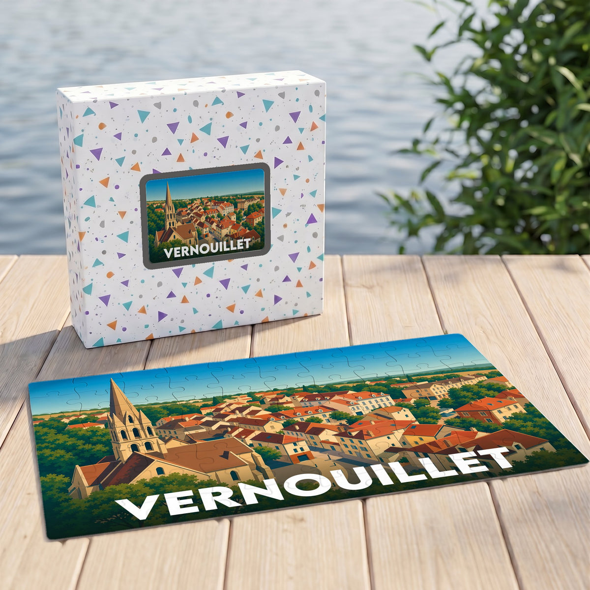 Puzzle souvenir de la ville de Vernouillet avec une illustration panoramique stylisée.