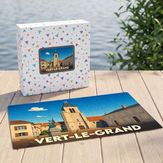 Puzzle souvenir de la ville de Vert-le-Grand avec une illustration stylisée d'une place et de son église.