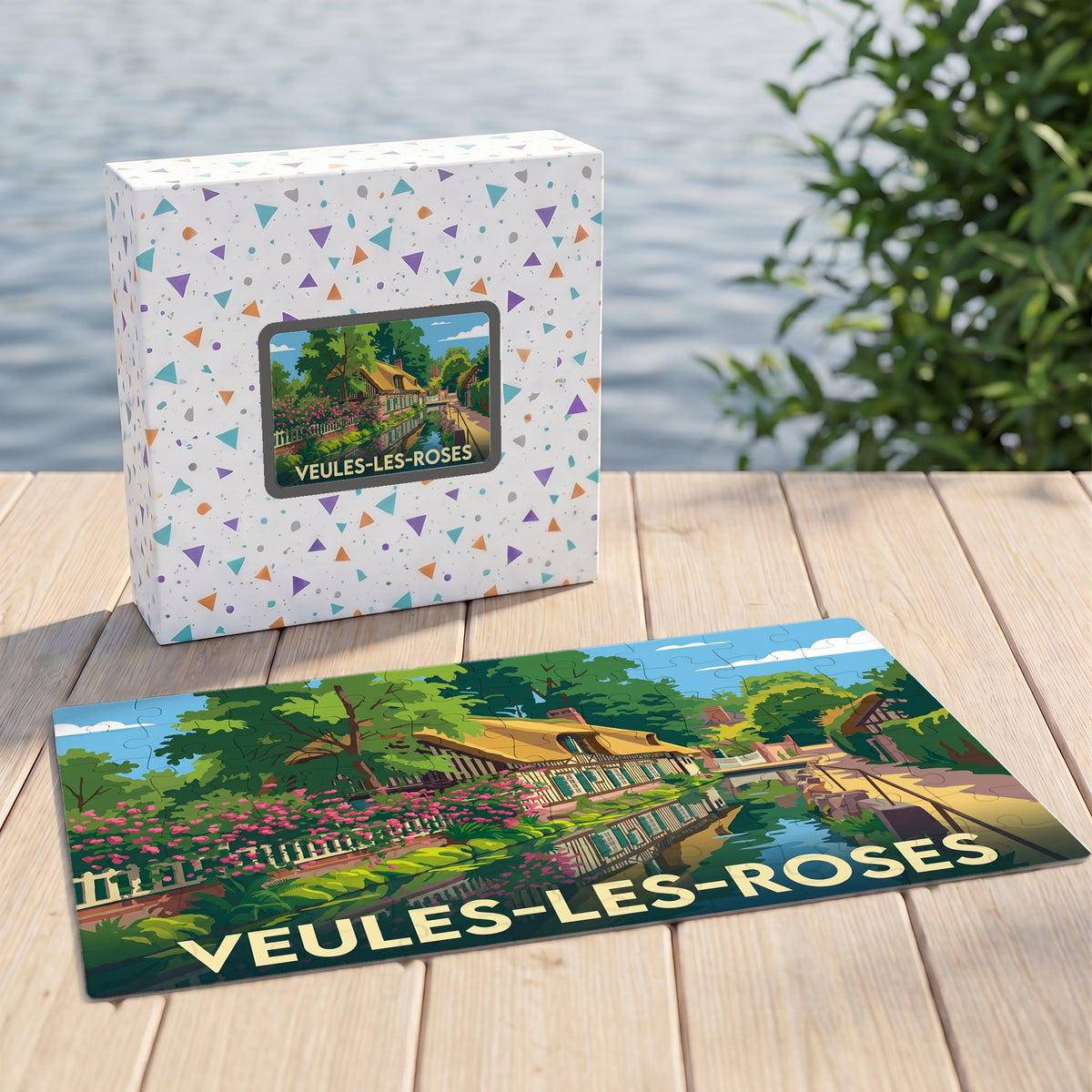 Puzzle souvenir de la ville de Veules-les-Roses avec une illustration stylisée et colorée de ses chaumières au bord de l'eau.