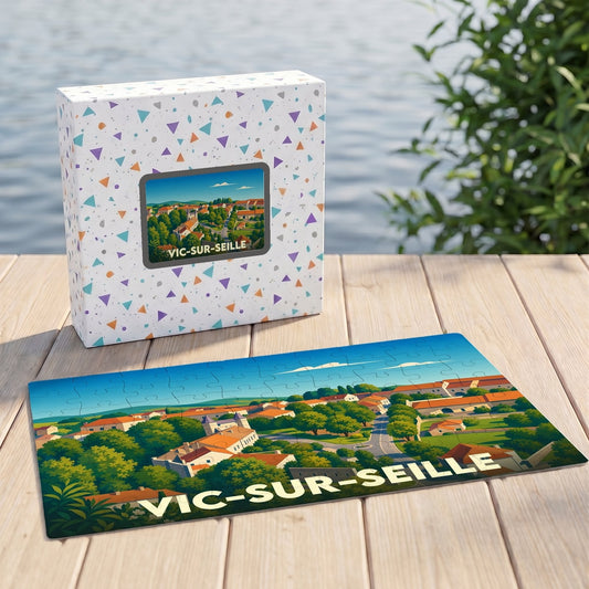 Puzzle souvenir de la ville de Vic-sur-Seille avec une illustration stylisée et sa boîte assortie.