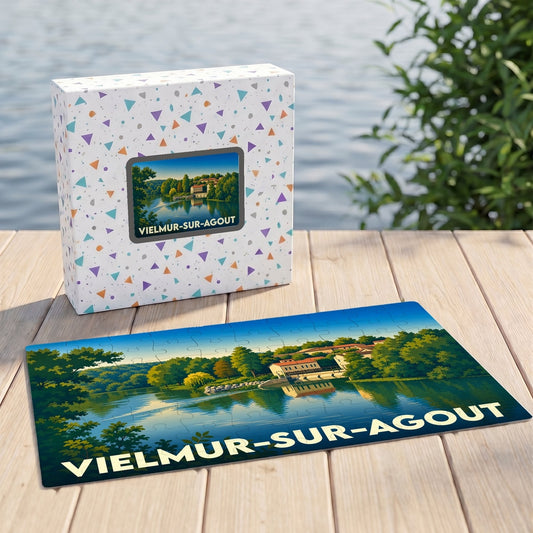Puzzle souvenir de la ville de Vielmur-sur-Agout avec une illustration stylisée de son paysage au bord de l'eau.