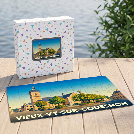 Puzzle souvenir de Vieux-Vy-sur-Couesnon illustré d'une vue stylisée du bourg et de son église.