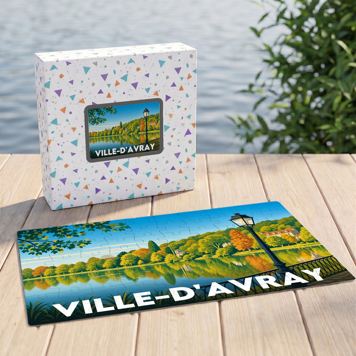Puzzle souvenir de la ville de Ville-d'Avray avec une illustration stylisée d'un paysage lacustre automnal.