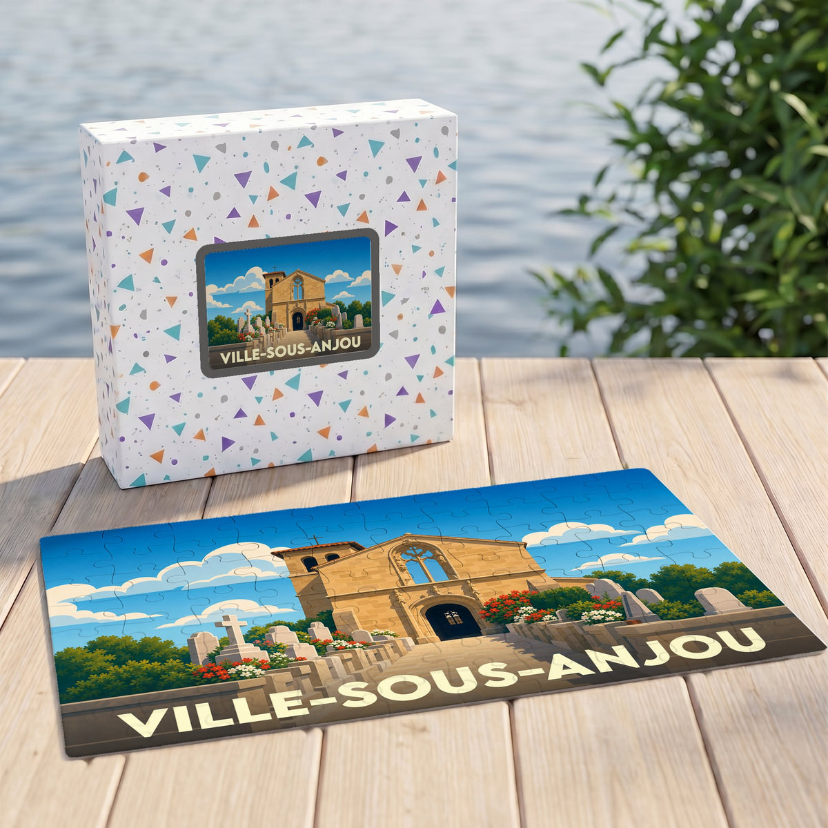 Puzzle souvenir de Ville-sous-Anjou présentant une illustration stylisée de son église et de son cimetière.