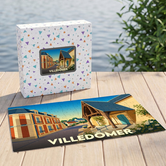 Puzzle souvenir de la ville de Villedômer avec une illustration stylisée et sa boîte assortie.