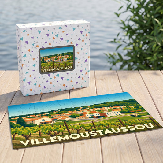 Puzzle souvenir de la ville de Villemoustaussou avec une illustration colorée d'un paysage de vignobles.