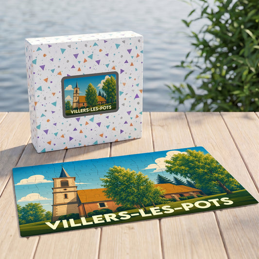 Puzzle souvenir de la ville de Villers-les-Pots avec une illustration stylisée d'une église et de sa boîte assortie.