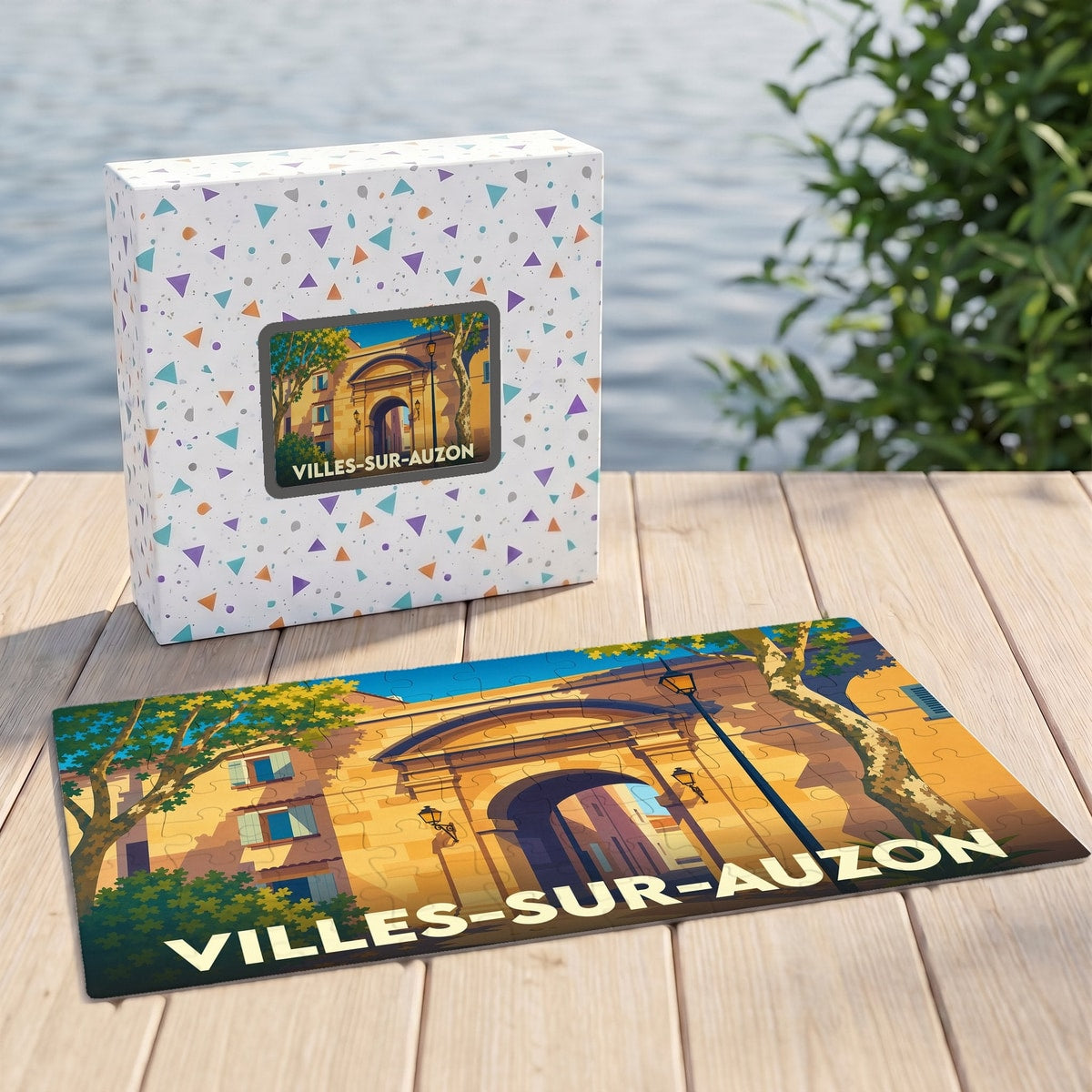 Puzzle souvenir de la ville de Villes-sur-Auzon avec une illustration stylisée d'une porte historique.