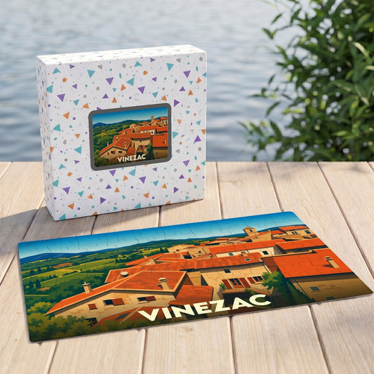 Puzzle souvenir de la ville de Vinezac présentant une illustration stylisée de ses toits provençaux.