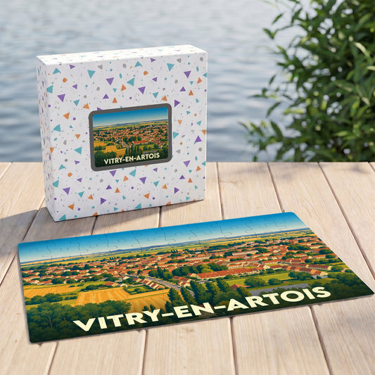 Puzzle souvenir de la ville de Vitry-en-Artois illustré par une vue aérienne stylisée.