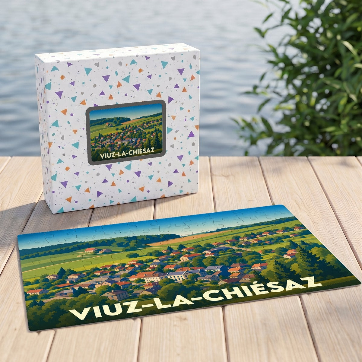 Puzzle souvenir de la ville de Viuz-la-Chiésaz avec une illustration panoramique stylisée du village.