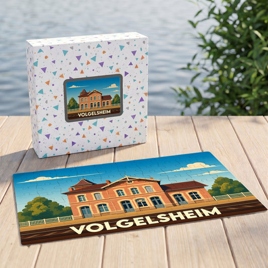 Puzzle souvenir de la ville de Volgelsheim avec une illustration stylisée de sa gare ferroviaire.