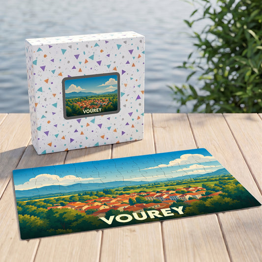 Puzzle souvenir de la ville de Vourey illustrant un paysage vallonné et ensoleillé.