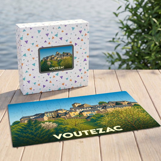 Puzzle souvenir de la ville de Voutezac avec une illustration stylisée d'un village perché.